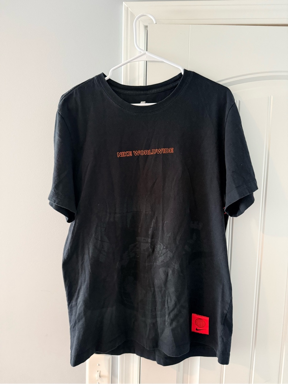 Nike Black Short-Sleeve Tee with Orange Logo and Red Patch
